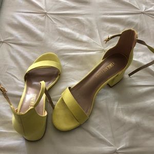 Woman’s yellow sandals